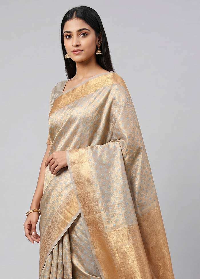 Cream Tissue Silk Saree With Blouse Piece