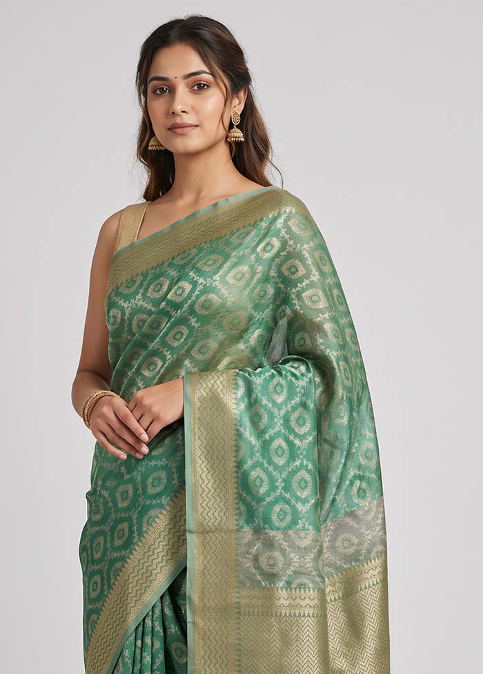 Green Tissue Silk Saree With Blouse Piece