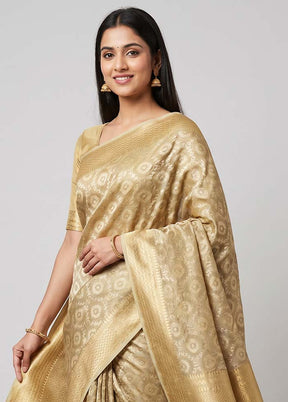 Cream Tissue Silk Saree With Blouse Piece