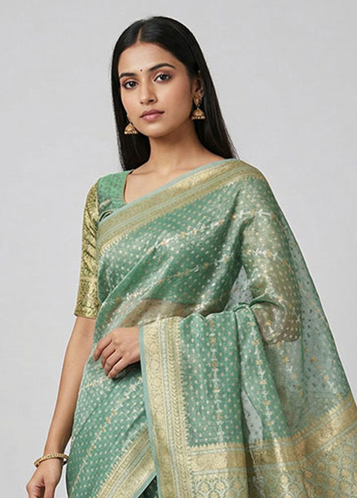 Green Tissue Silk Saree With Blouse Piece
