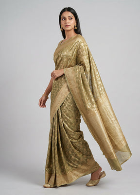 Green Tissue Silk Saree With Blouse Piece