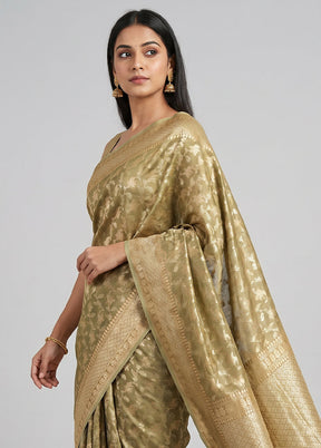 Green Tissue Silk Saree With Blouse Piece