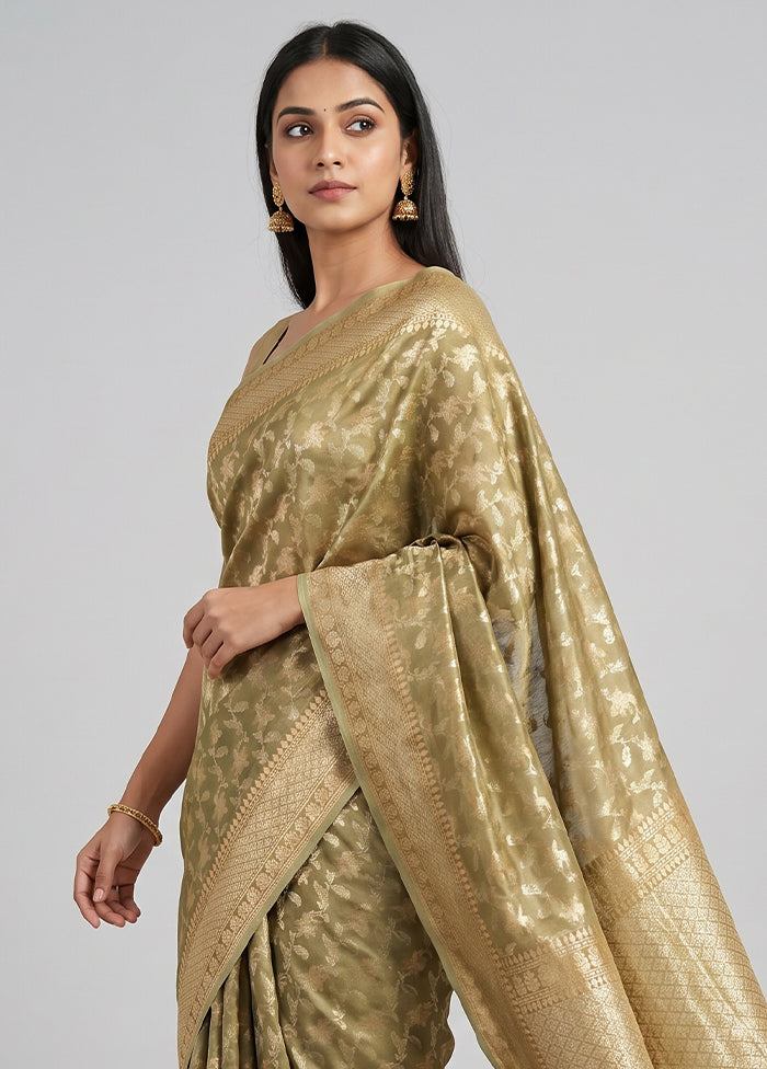 Green Tissue Silk Saree With Blouse Piece