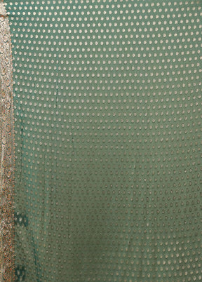 Green Handloom Pure Georgette Saree With Blouse Piece