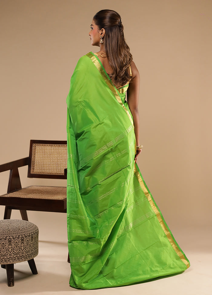Green Kanjivaram Silk Saree With Blouse Piece
