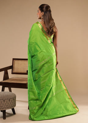 Green Kanjivaram Silk Saree With Blouse Piece
