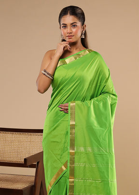 Green Kanjivaram Silk Saree With Blouse Piece