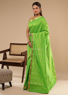 Green Kanjivaram Silk Saree With Blouse Piece
