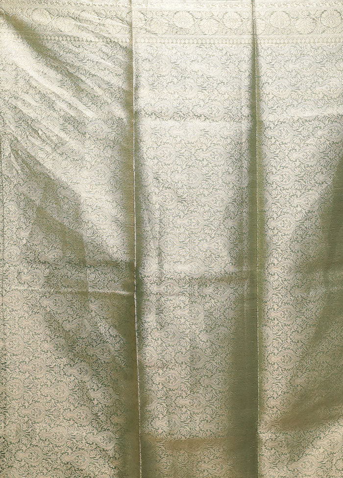 Green Tissue Silk Saree With Blouse Piece