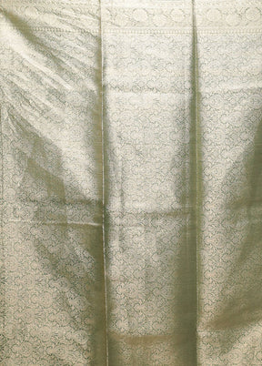 Green Tissue Silk Saree With Blouse Piece