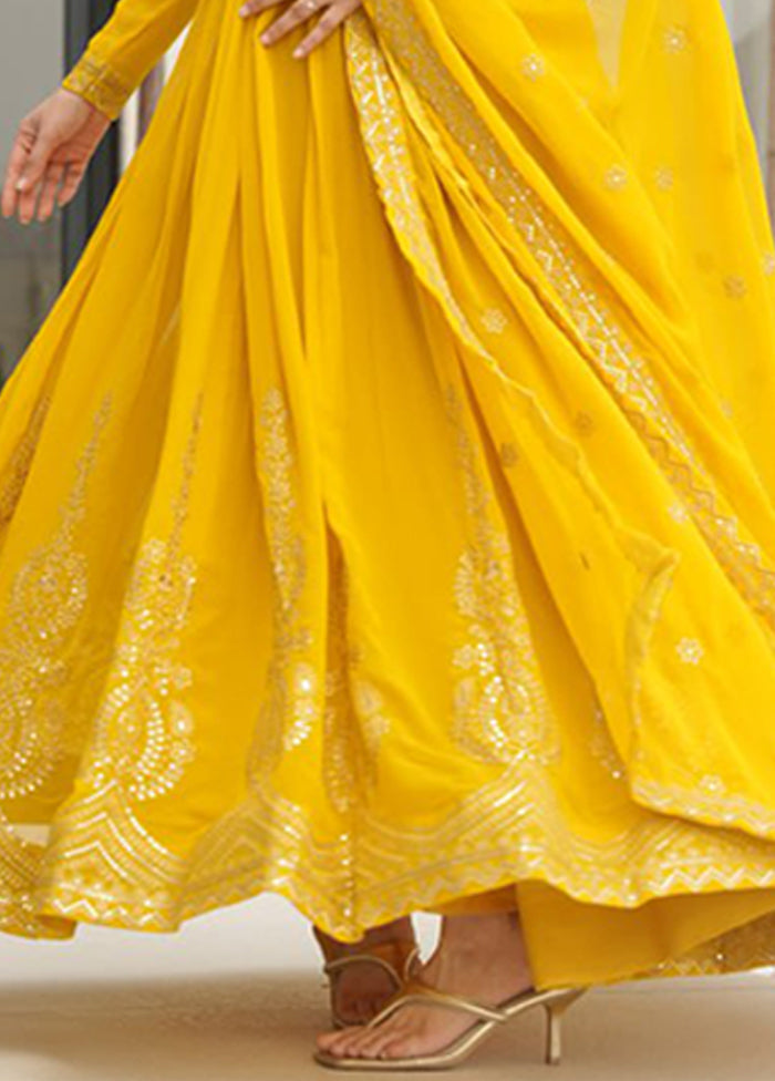 Golden Woven Work Silk Gown With Dupatta