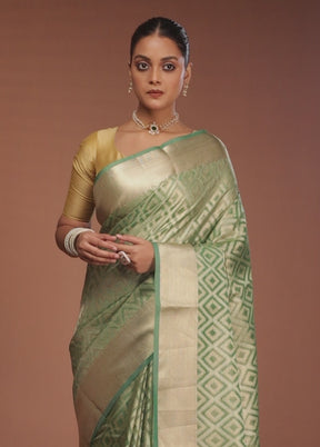 Green Tissue Silk Saree With Blouse Piece