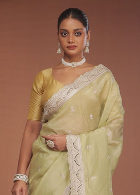Green Tissue Silk Saree With Blouse Piece