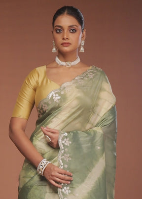 Green Tissue Silk Saree With Blouse Piece