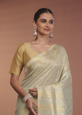 Green Tissue Silk Saree With Blouse Piece