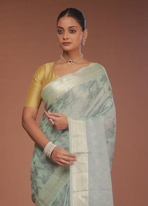 Green Cotton Saree With Blouse Piece