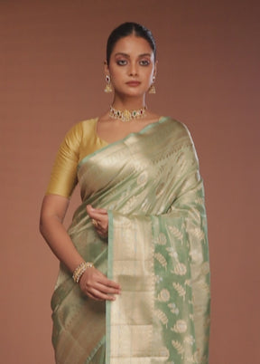 Green Tissue Silk Saree With Blouse Piece