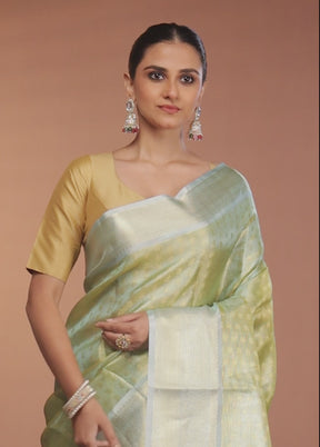 Green Tissue Silk Saree With Blouse Piece